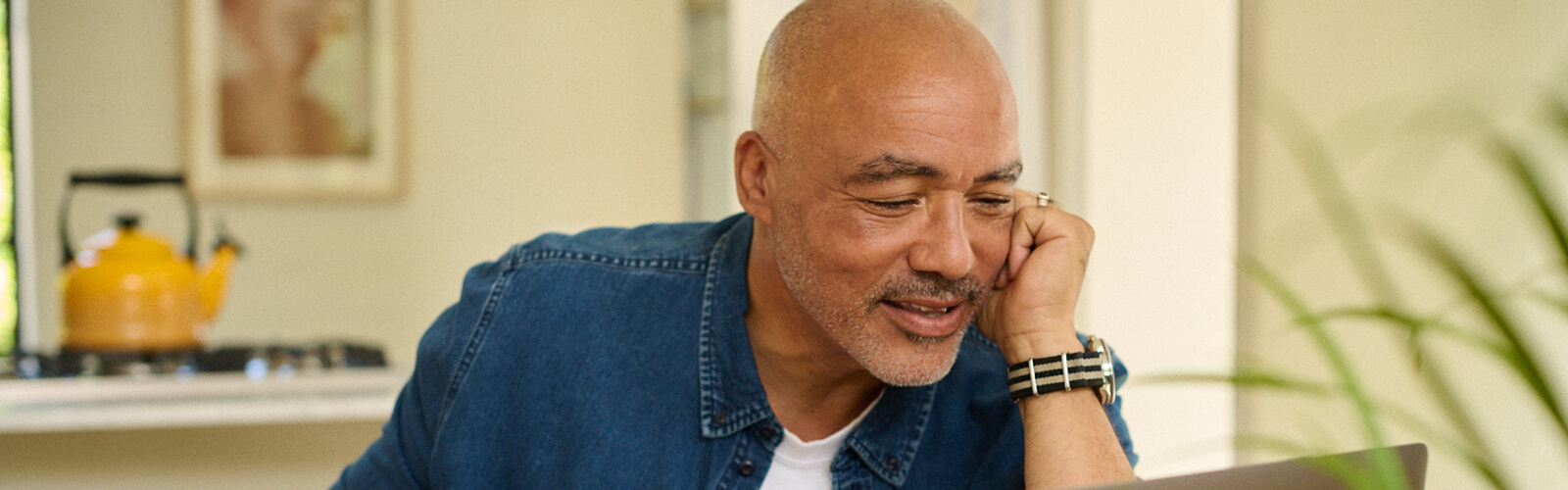 Man sitting outside having a conversation  Man sitting outside having a conversation